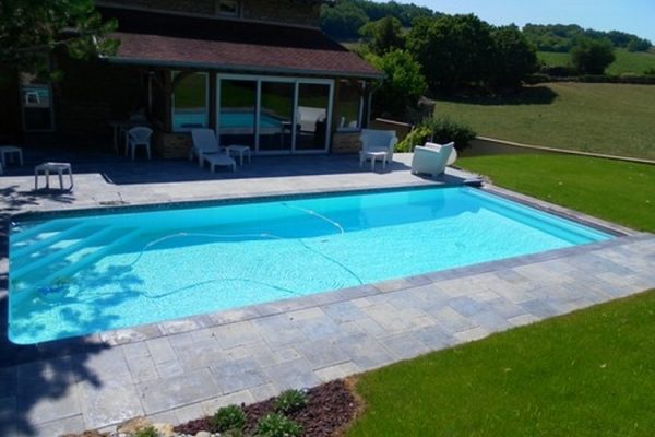 Les piscines et spas par Perret Paysage à Tournus