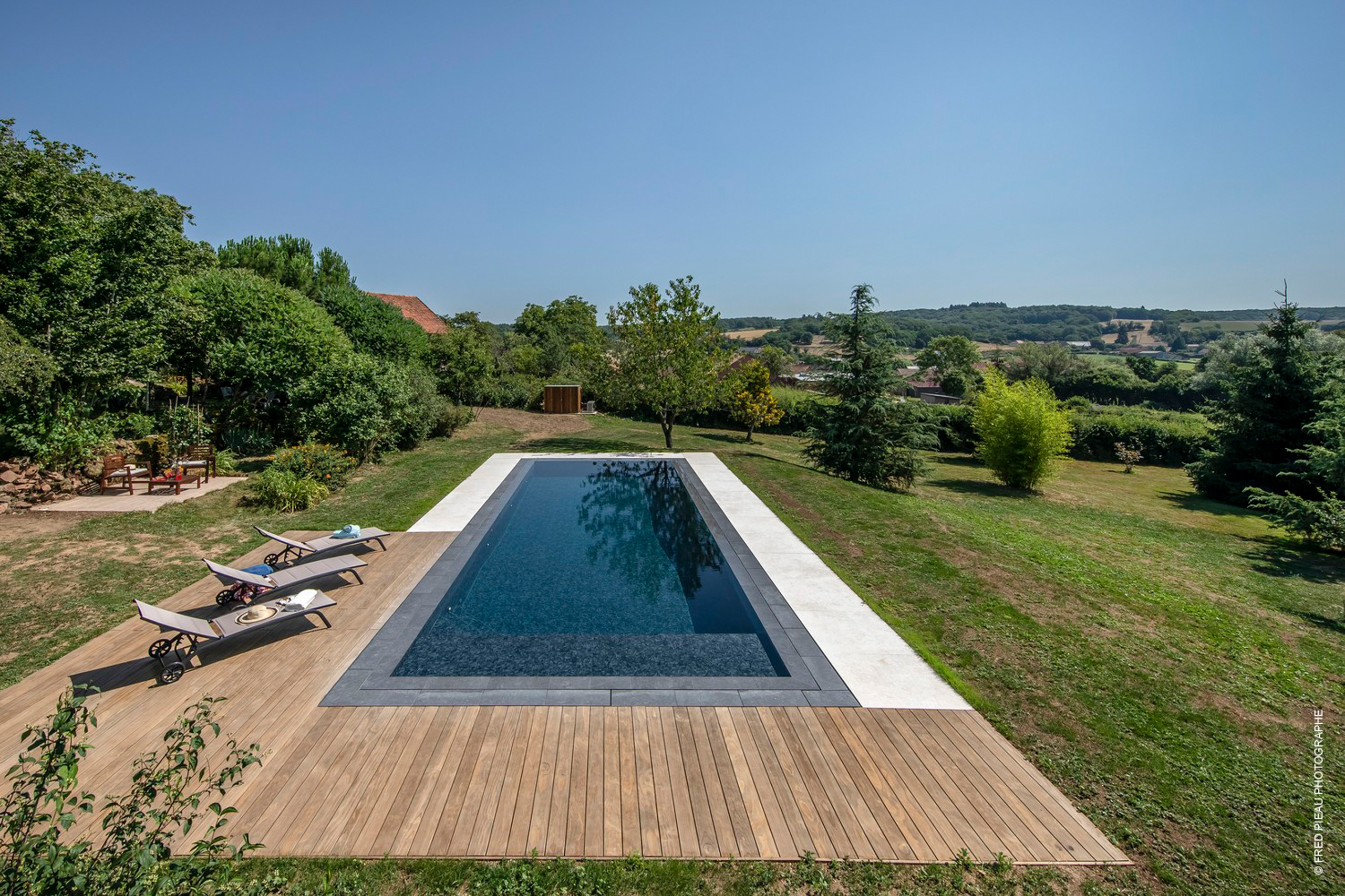 Installation de piscine et couloir de nage | Perret Paysage