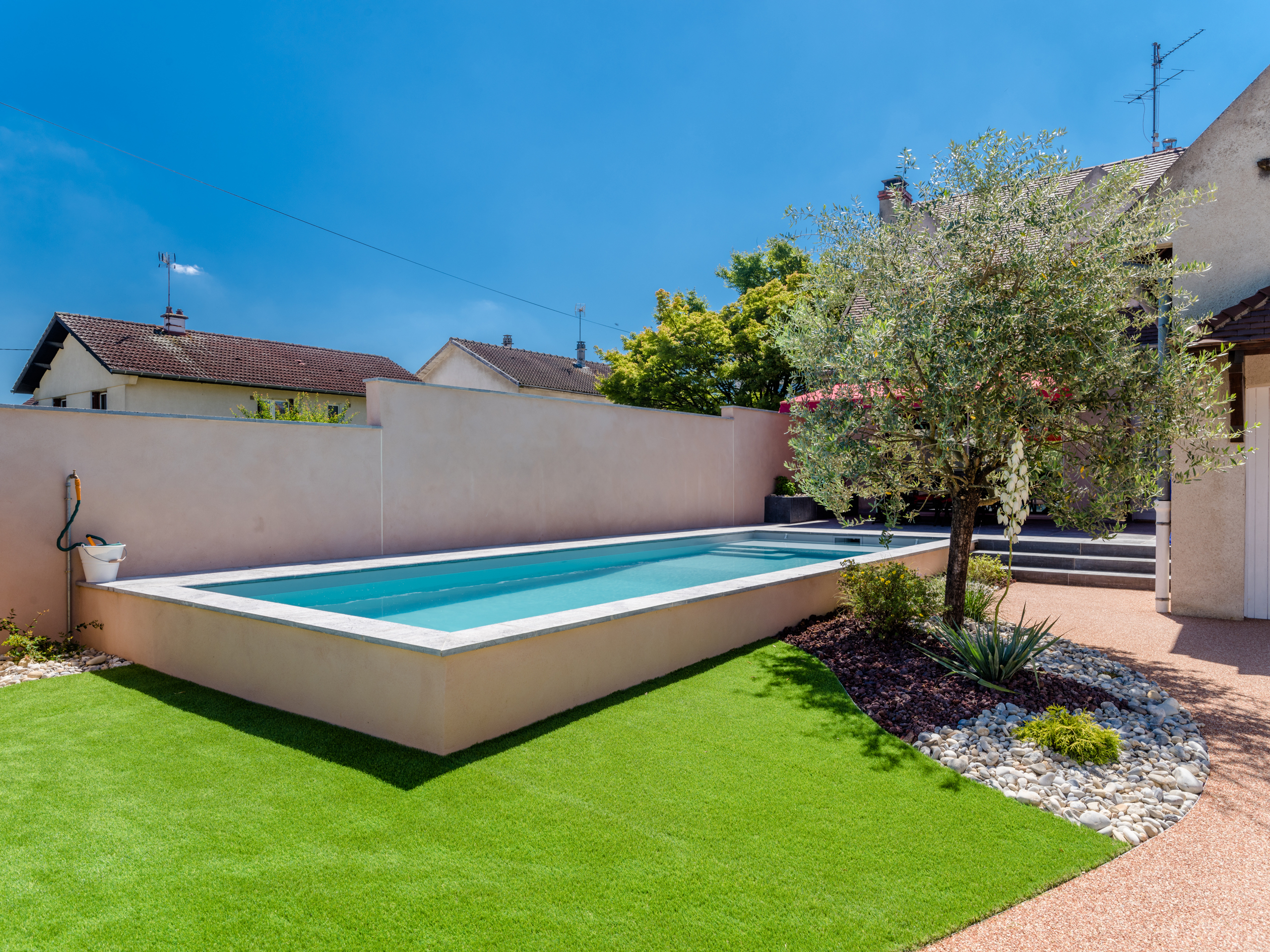 Installation de piscine et couloir de nage | Perret Paysage